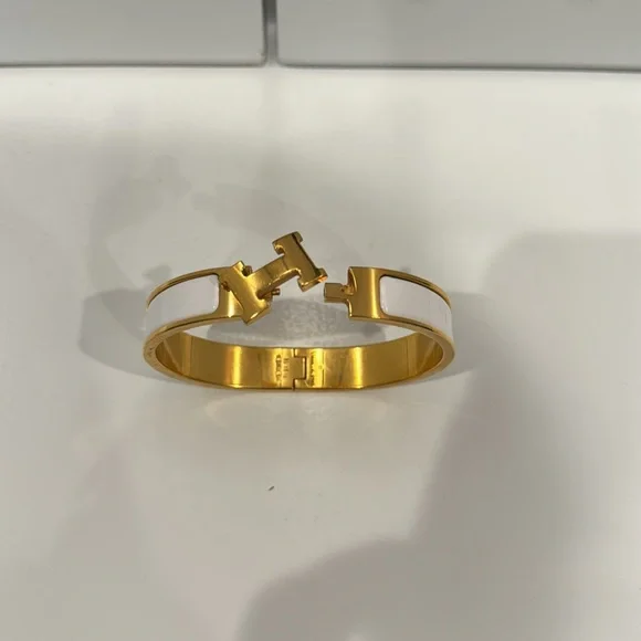 Authentic Hermès Clic H narrow bracelet in white enamel with gold hardware - Picture 2 of 2